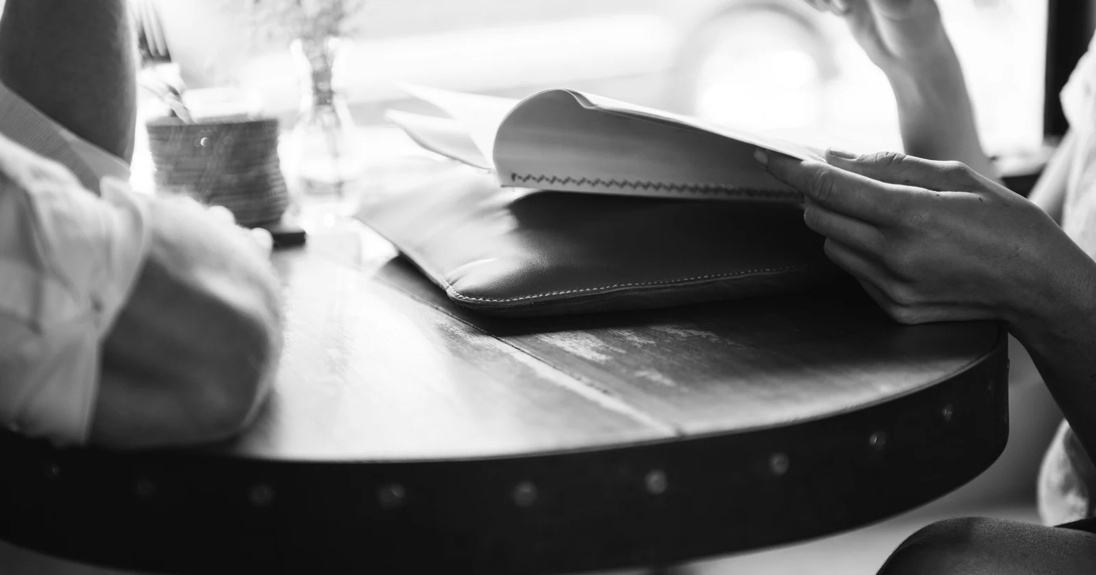 People reviewing documents together at a table