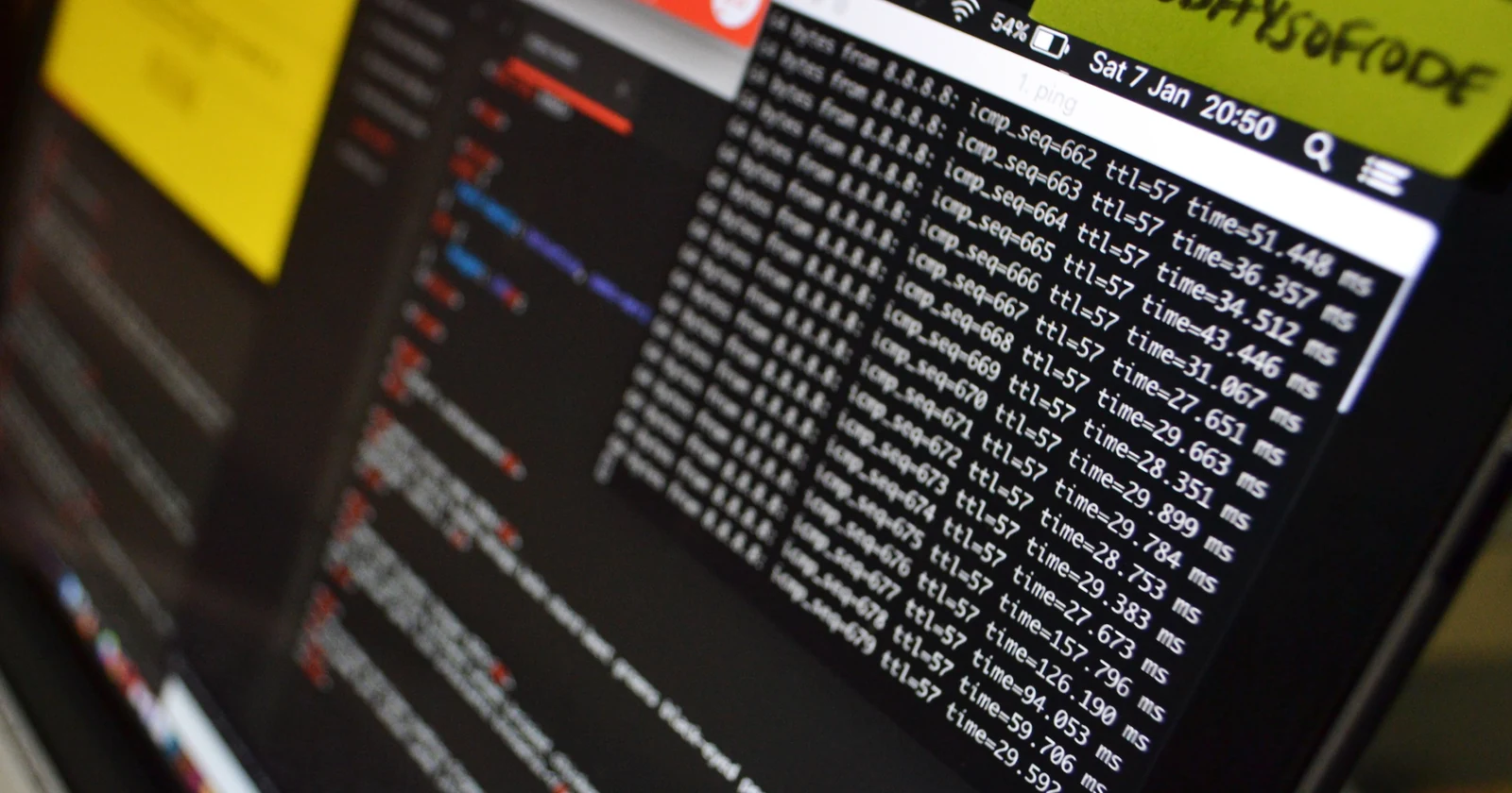 Computer screen displaying code and system output