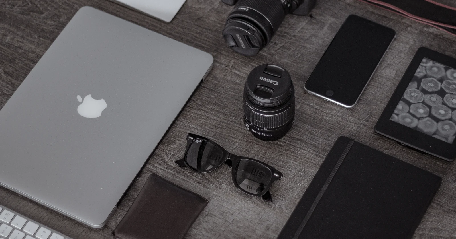 Laptop, phone and other work equipment arranged together
